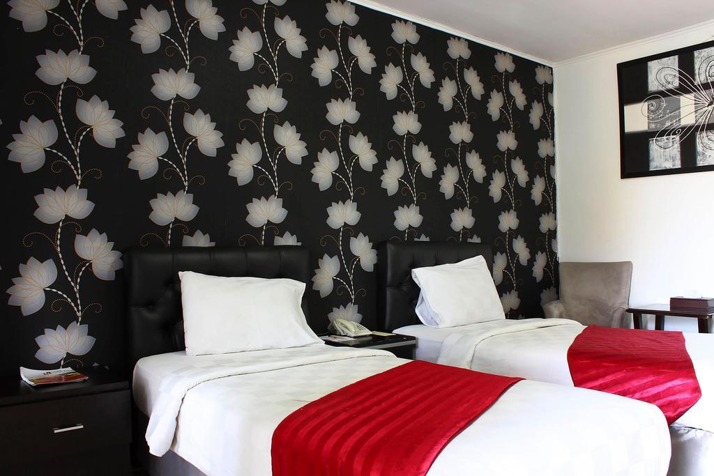 The Rizen Hotel Кисаруа Екстериор снимка