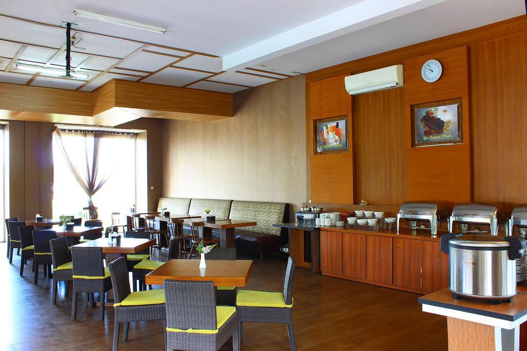 The Rizen Hotel Кисаруа Екстериор снимка
